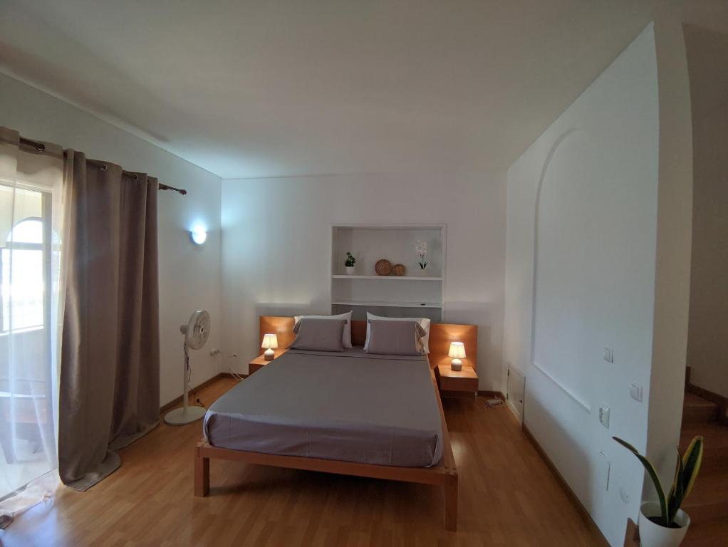 Postel nebo postele na pokoji v ubytování Casa TIANA