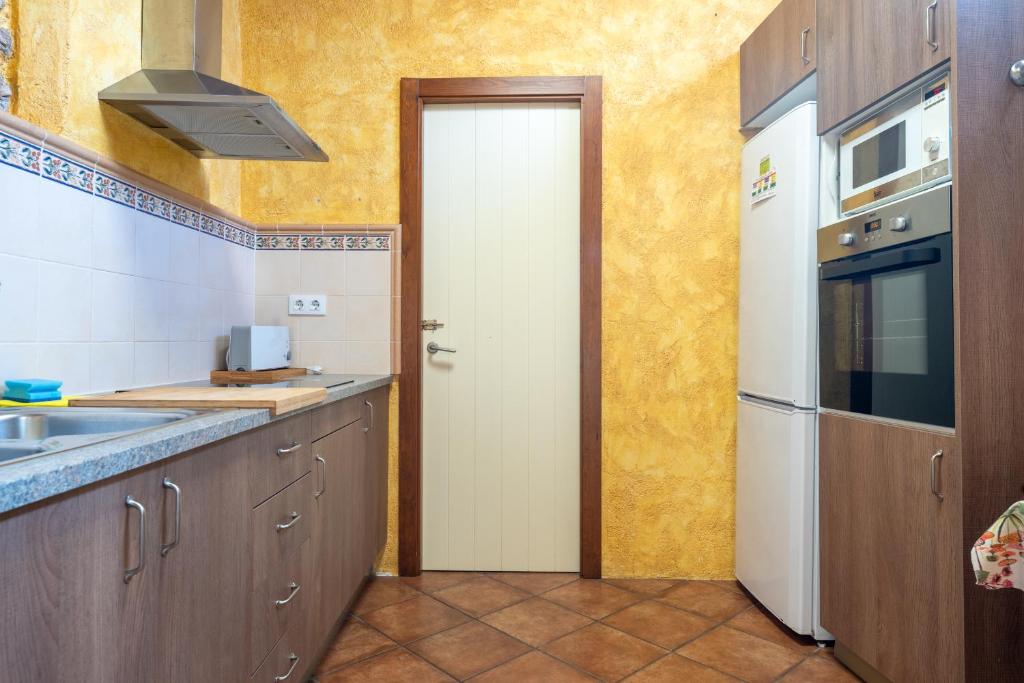 Kuchyň nebo kuchyňský kout v ubytování Hauzify I Casa Rourell