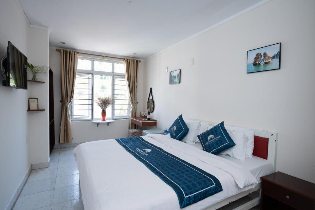 Postel nebo postele na pokoji v ubytování mountainperl hotel 2