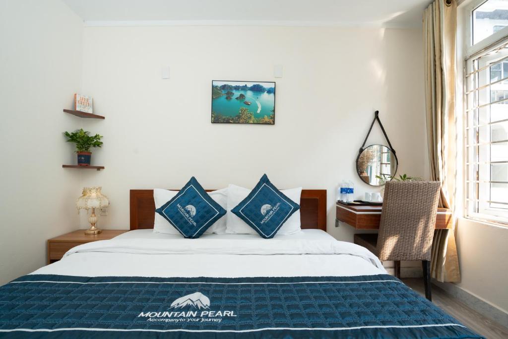 Postel nebo postele na pokoji v ubytování mountainperl hotel 2