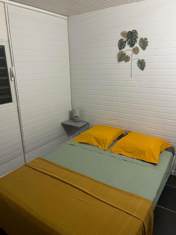 Postel nebo postele na pokoji v ubytování an eol caraibes