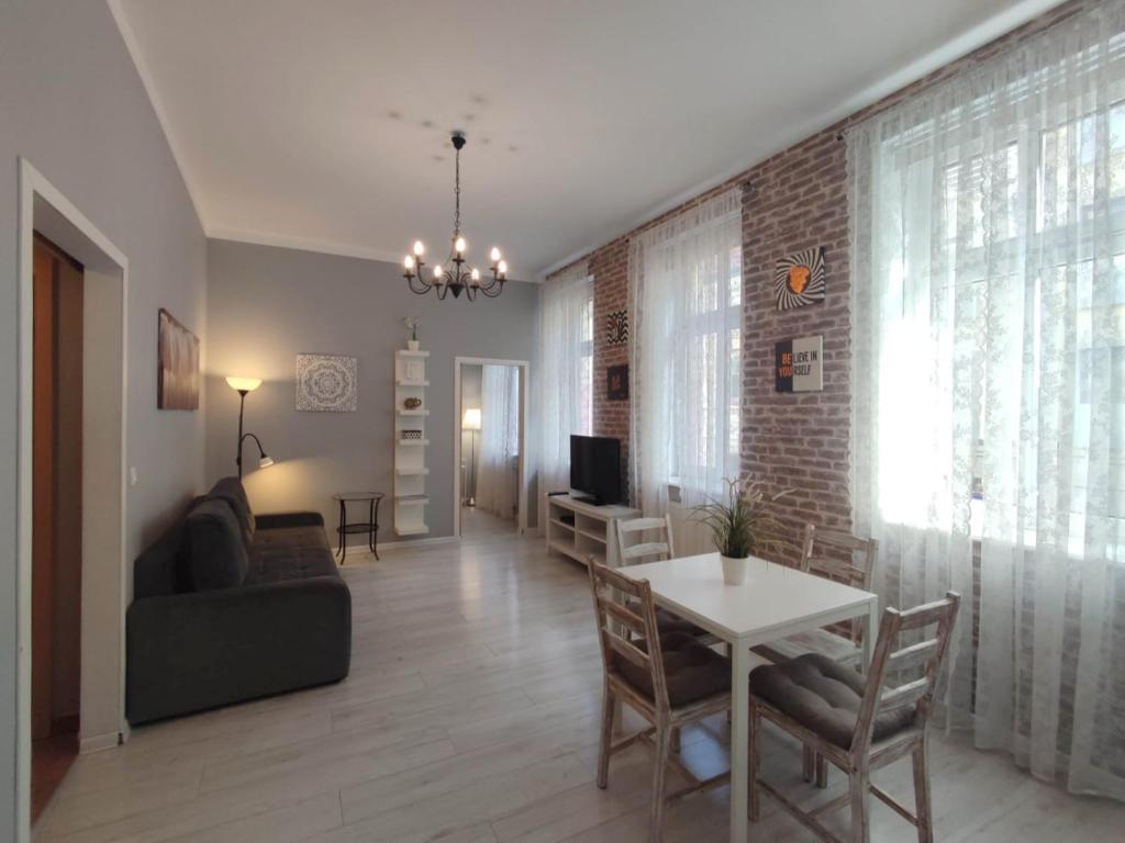 Μια τηλεόραση ή/και κέντρο ψυχαγωγίας στο KGHN Apartments Tkacka