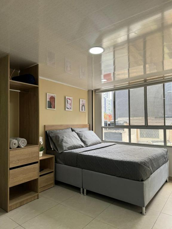 Postel nebo postele na pokoji v ubytování Hostelfc Chapinero