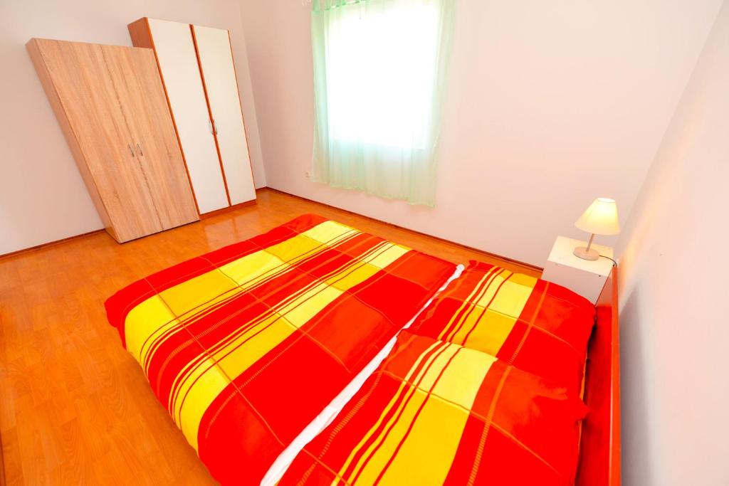 Łóżko lub łóżka w pokoju w obiekcie Apartment Dadi