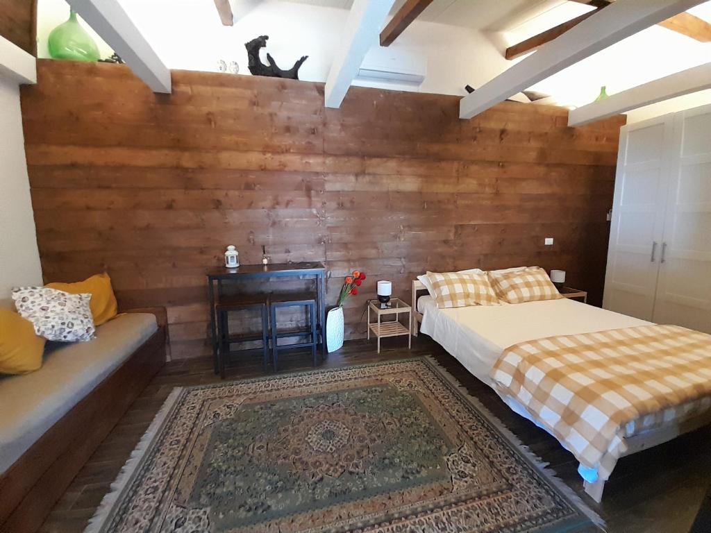 Postel nebo postele na pokoji v ubytování Etna Country Home