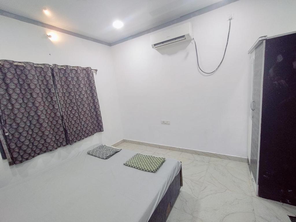 Postel nebo postele na pokoji v ubytování Hotel seafront