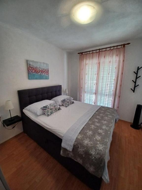 Posteľ alebo postele v izbe v ubytovaní Apartment Marijica