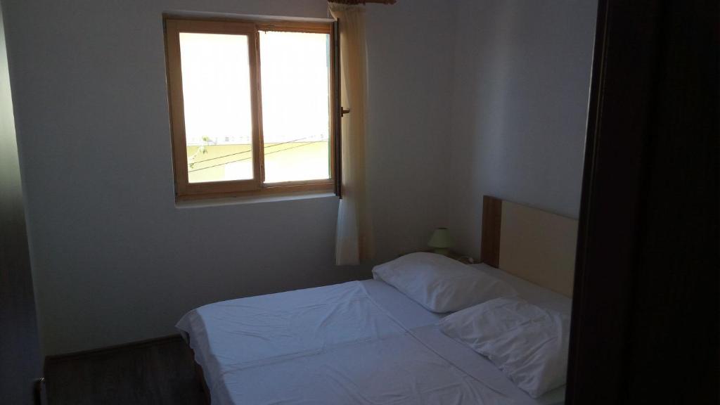 Posteľ alebo postele v izbe v ubytovaní Apartment Marijica