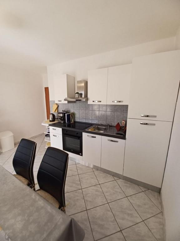 Kuchyňa alebo kuchynka v ubytovaní Apartment Marijica