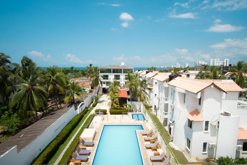 Bazén v ubytování Hotel Caribe Coveñas nebo v jeho okolí