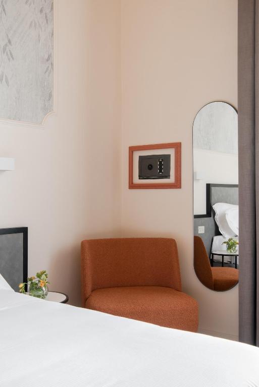 Postel nebo postele na pokoji v ubytování Hotel Fiorita