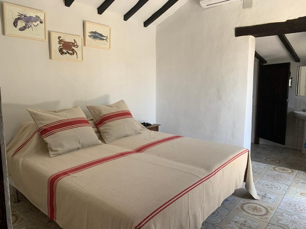 Postel nebo postele na pokoji v ubytování Casa el Chorro
