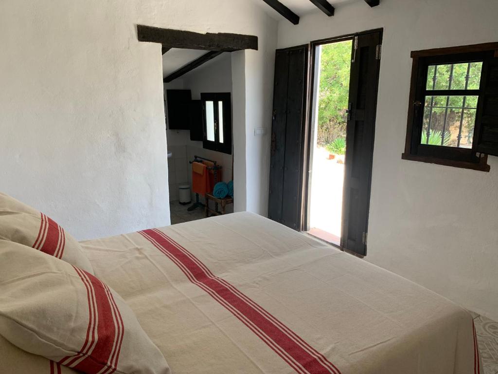 Postel nebo postele na pokoji v ubytování Casa el Chorro