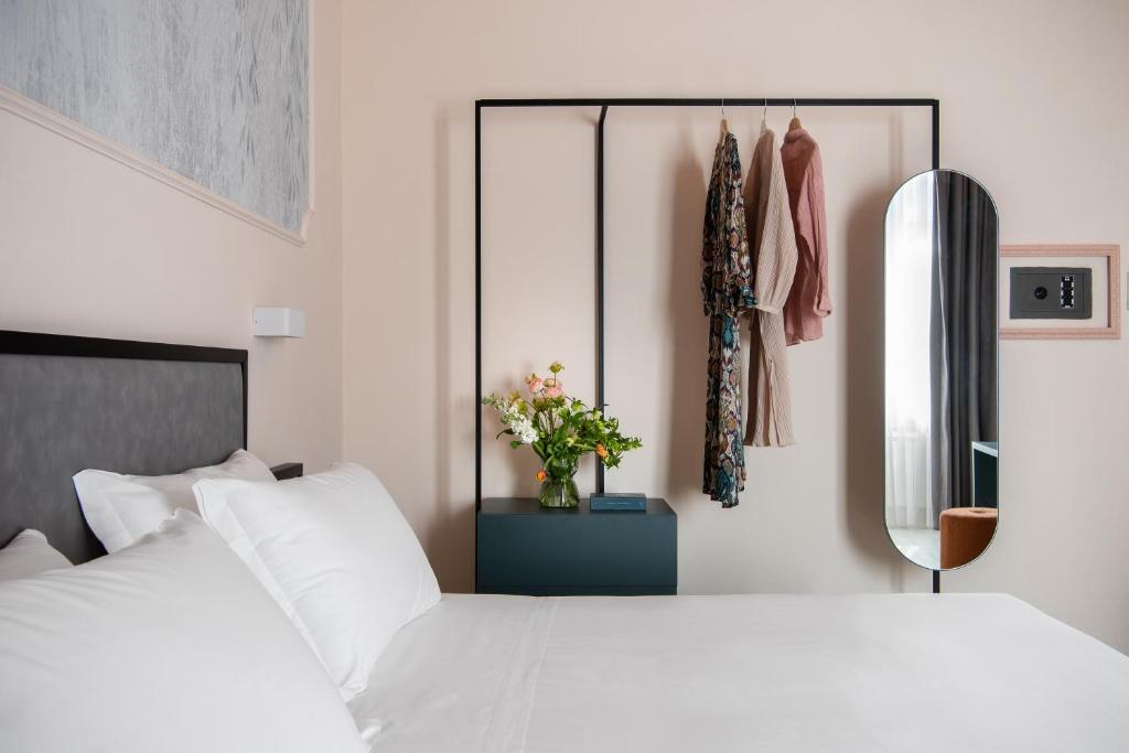 Postel nebo postele na pokoji v ubytování Hotel Fiorita