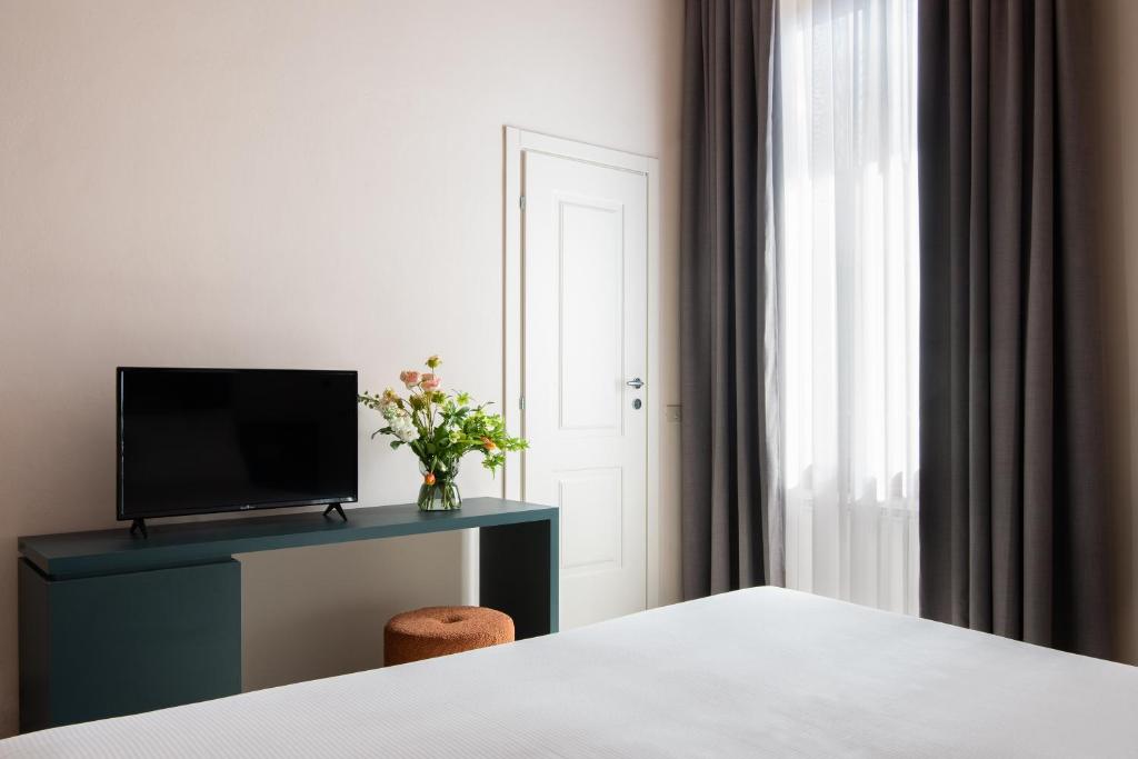 TV a/nebo společenská místnost v ubytování Hotel Fiorita