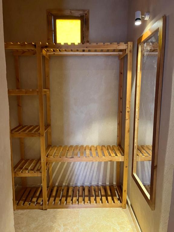 Palanda nebo palandy na pokoji v ubytování فندق إريغن Erighin siwa hotel