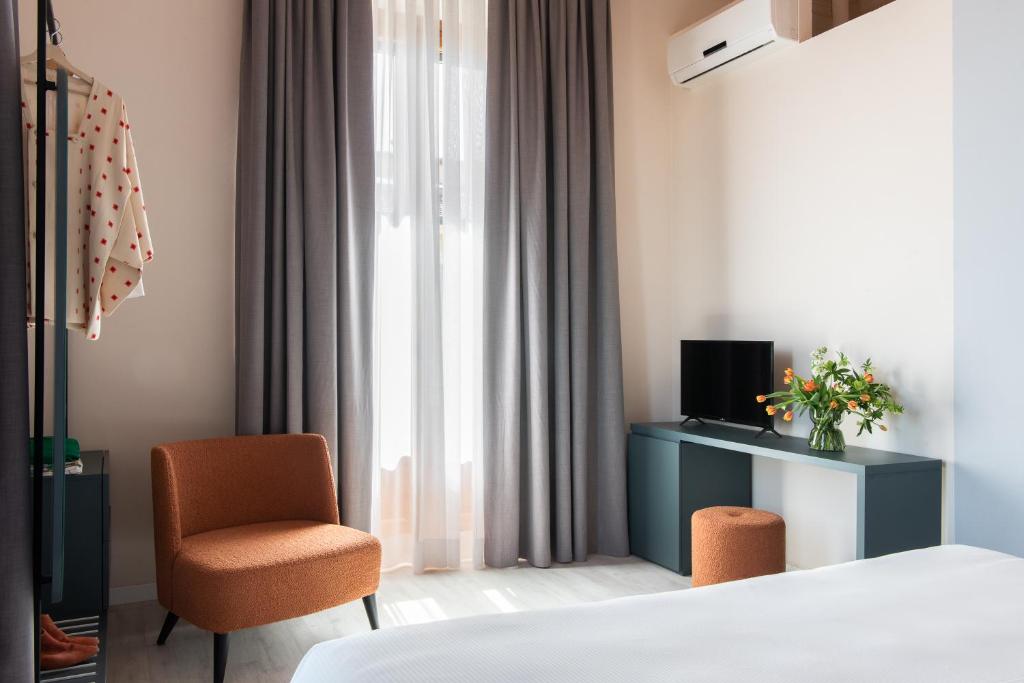 TV a/nebo společenská místnost v ubytování Hotel Fiorita