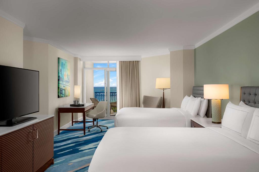 Hilton Aruba Caribbean Resort & Casino - Partial Ocean View Palm Beach Club 2 Queen Beds