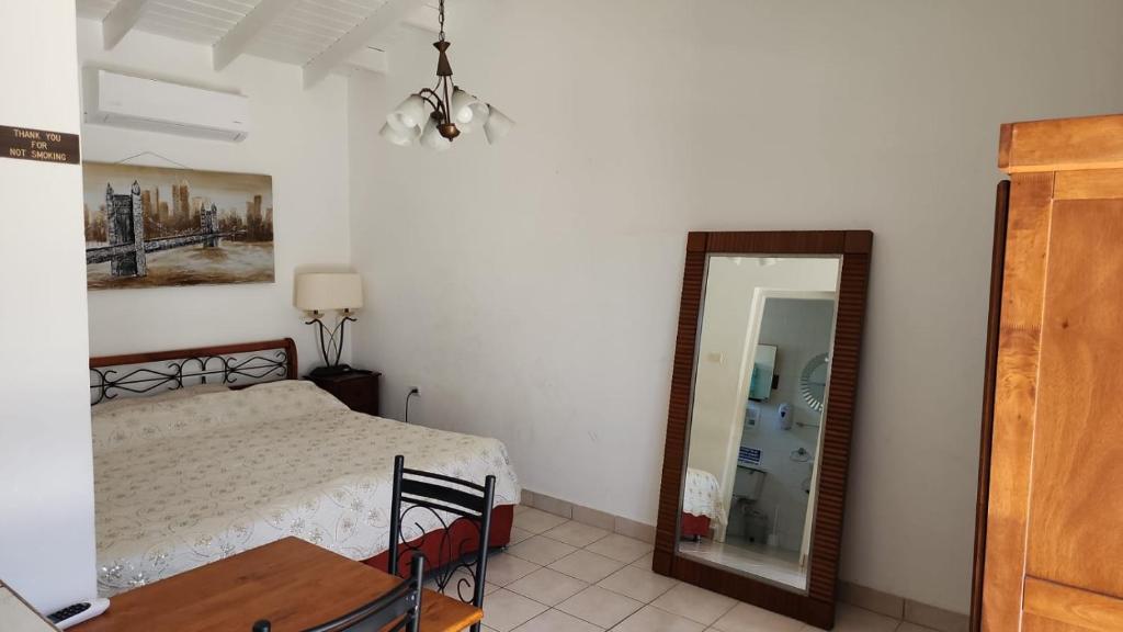 Postel nebo postele na pokoji v ubytování FIRST DAY HOSTEL on ARUBA