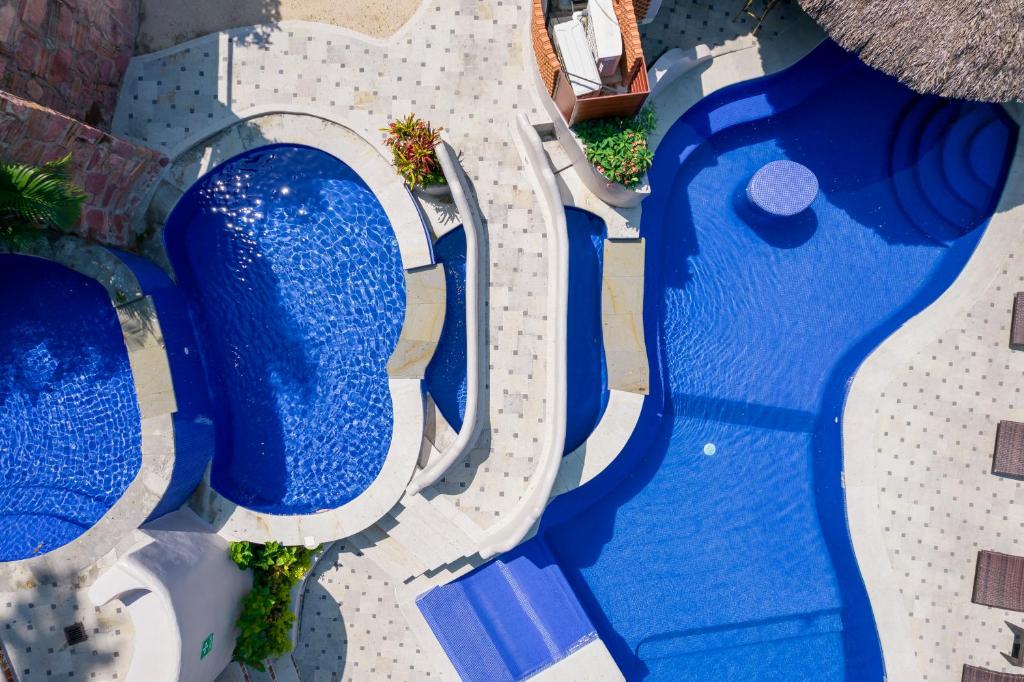 Bazén v ubytování Marcela Resort & Spa nebo v jeho okolí