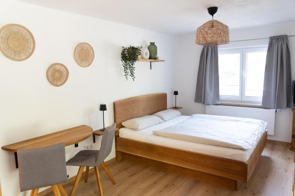 Ένα ή περισσότερα κρεβάτια σε δωμάτιο στο Apartment am Hopfensee