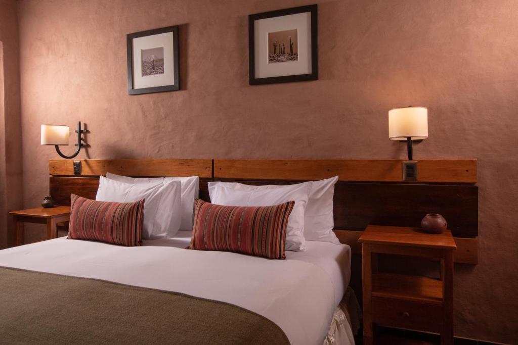 Postel nebo postele na pokoji v ubytování Hotel Pascual Andino