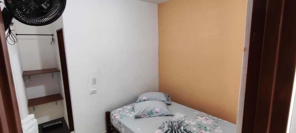 Postel nebo postele na pokoji v ubytování Guayacan Hostel