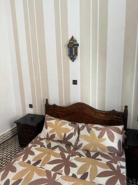 Postel nebo postele na pokoji v ubytování Hotel majestc