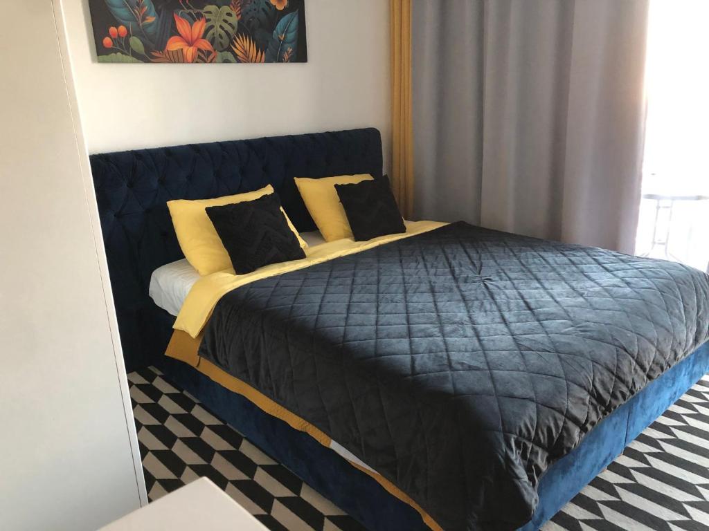 Posteľ alebo postele v izbe v ubytovaní Apartment