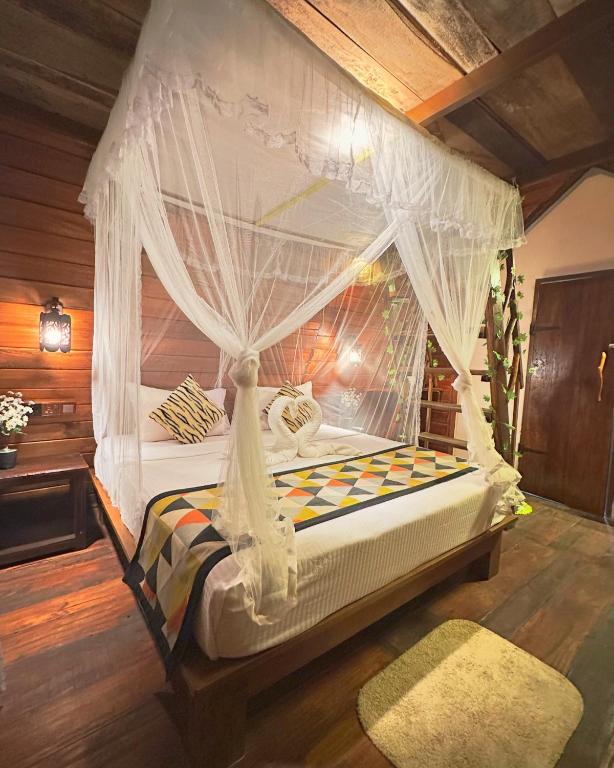 Postel nebo postele na pokoji v ubytování Levona Garden Resort