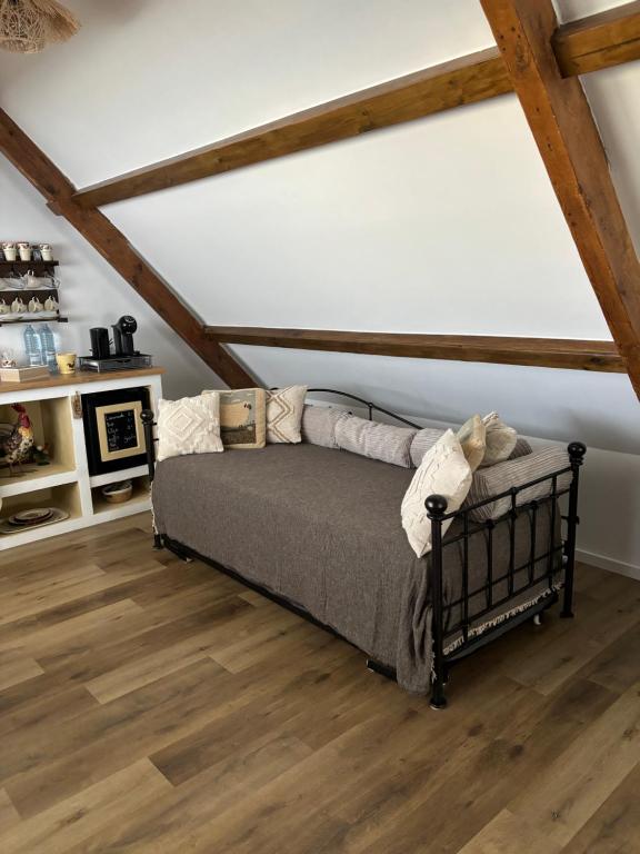 Postel nebo postele na pokoji v ubytování B&B Aan de Schenkel