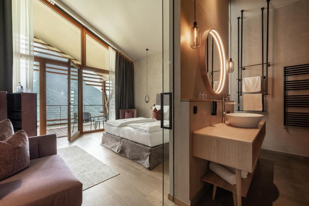 Postel nebo postele na pokoji v ubytování Hotel Valentinerhof
