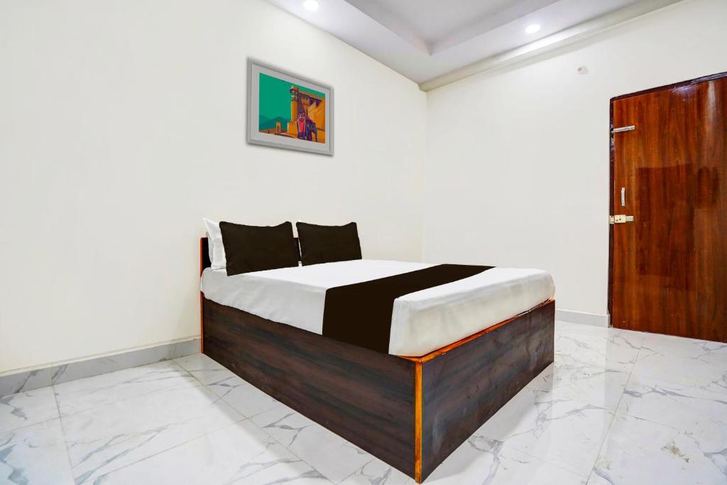 Postel nebo postele na pokoji v ubytování Hotel O DIVA INN - II