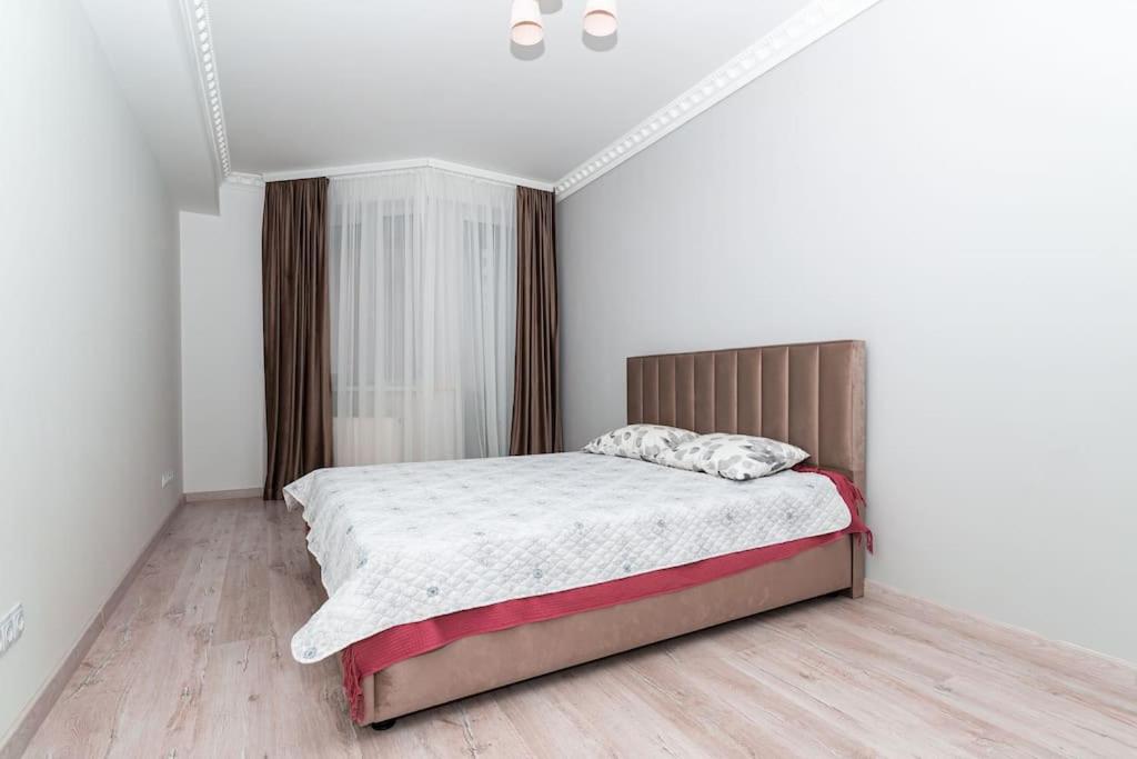 Llit o llits en una habitació de Centru, str Valea Trandafirilor