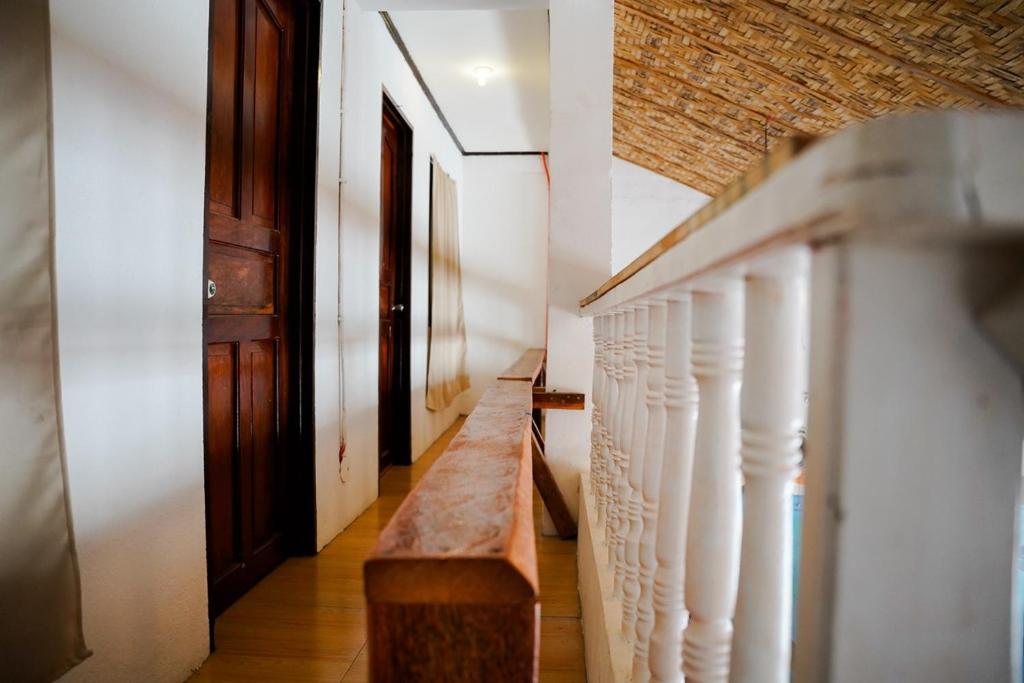Postel nebo postele na pokoji v ubytování Yes Surf Siargao