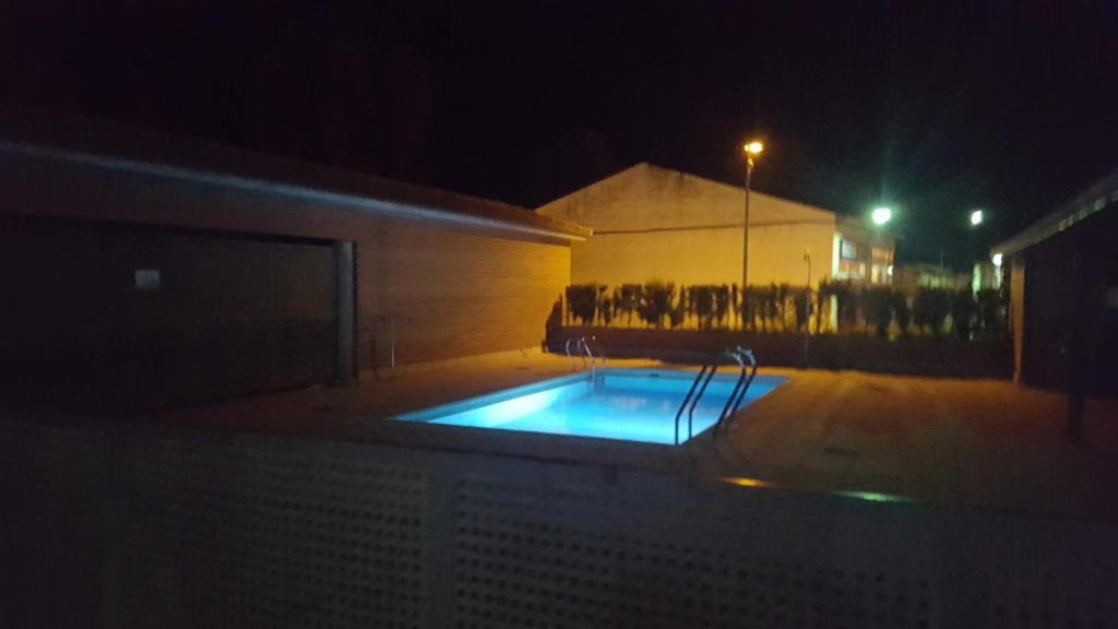 Piscina en o cerca de TU CASA EN MEQUINENZA CON WIFI