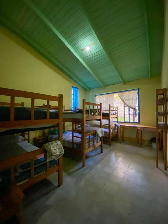 Postel nebo postele na pokoji v ubytování Hostal Juan Lindo