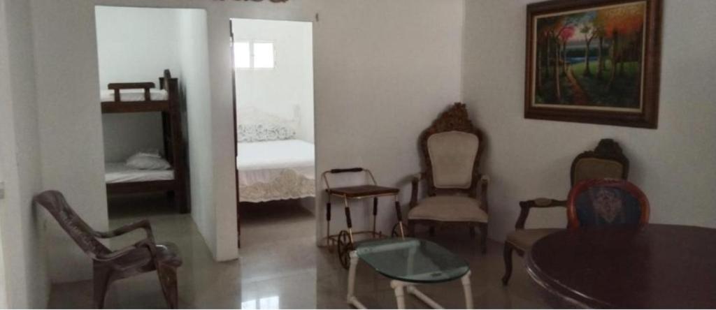 Ένα ή περισσότερα κρεβάτια σε δωμάτιο στο Apartamentos y habitaciones cerca a marbella