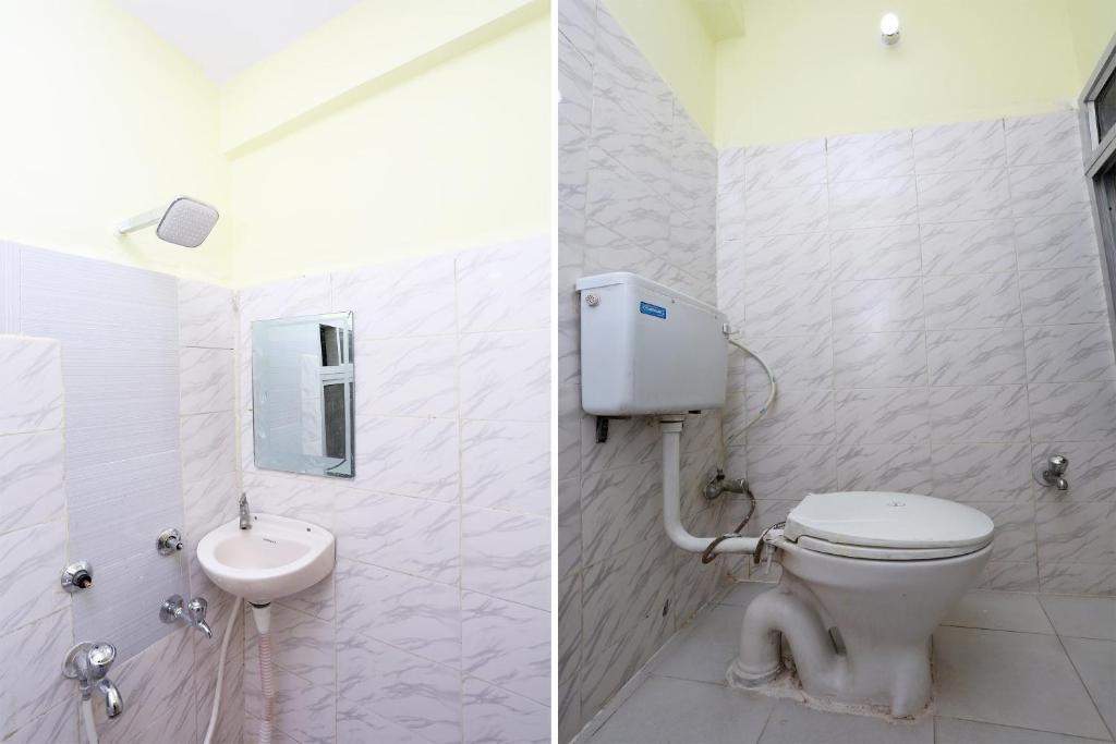 Koupelna v ubytování Hotel O Manoj