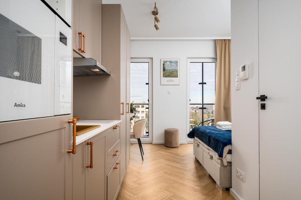 Posteľ alebo postele v izbe v ubytovaní Kasprzaka 29 Bliska Wola Tower By Perfect Apart