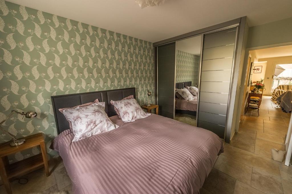 Postel nebo postele na pokoji v ubytování L'Appartement