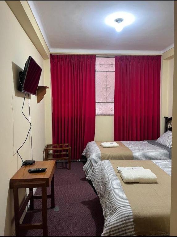 Postel nebo postele na pokoji v ubytování Posada Don Giorgio
