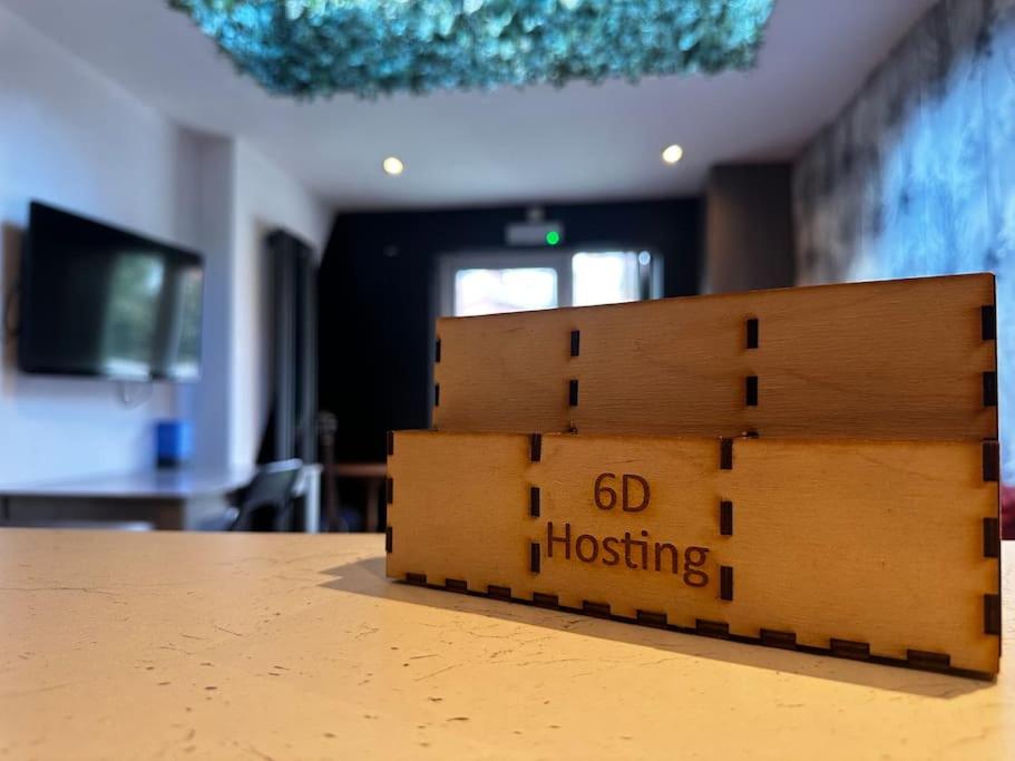 a pile of boxes sitting on top of a table at Central City Living - Stylish & Spacious 5 Bedrooms in Parkside