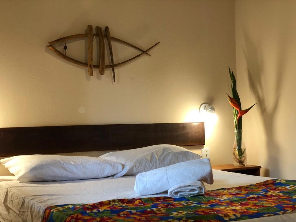 Postel nebo postele na pokoji v ubytování Alecrim Hostel e Pousada