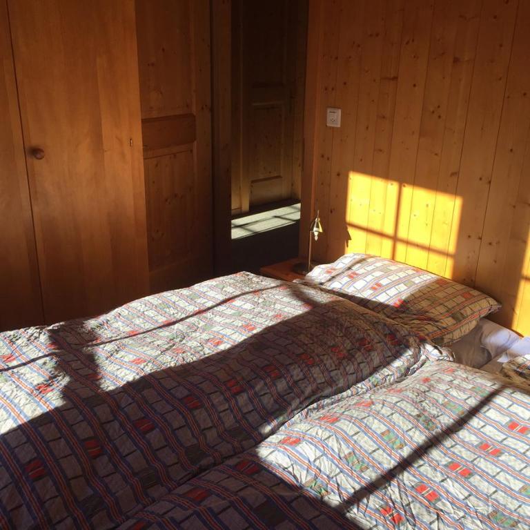 Postel nebo postele na pokoji v ubytování Chalet Annika