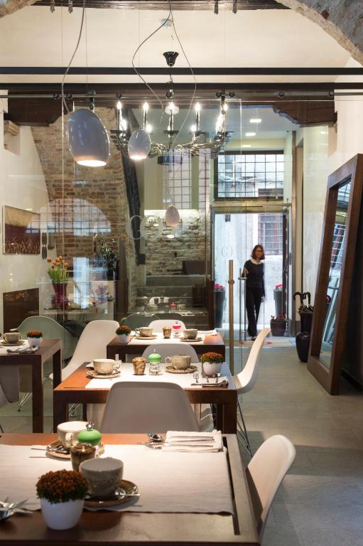 Reštaurácia alebo iné gastronomické zariadenie v ubytovaní Corte Di Gabriela