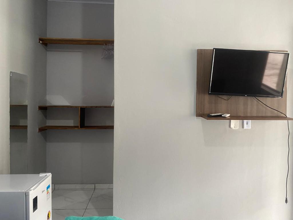 TV a/nebo společenská místnost v ubytování Pousada Aconchego Diamantina