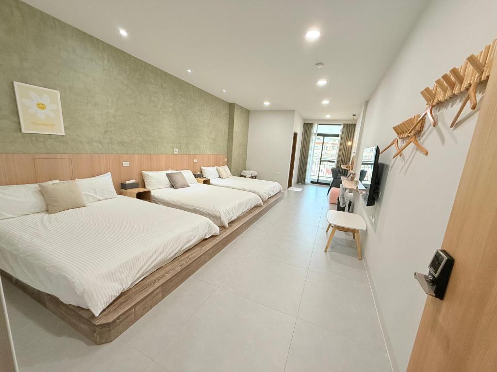 Postel nebo postele na pokoji v ubytování Tourist Vacation B&B