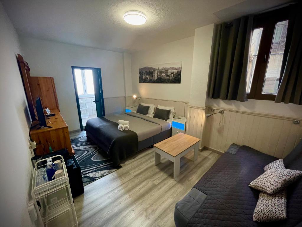 Zona de estar de Itinere Rooms