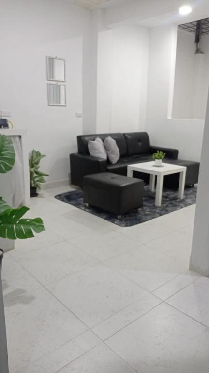 Posezení v ubytování Habitación de Lujo para grupo familiar